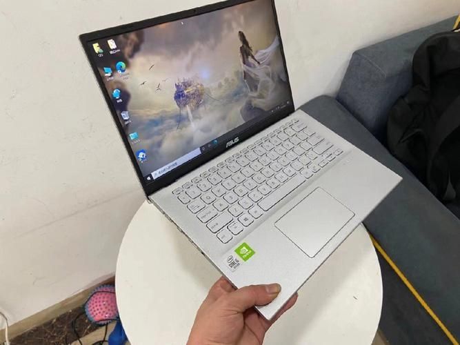 华硕VivoBook14X怎么将系统退回win7？